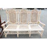 Reproduction French style bergere 3 seater bench painted in distressed white,