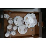 A collection of Shelley floral decorated tea ware in wild roses pattern to include dinner plates,