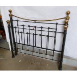 Modern Metal framed double bed with ball topped pillars.