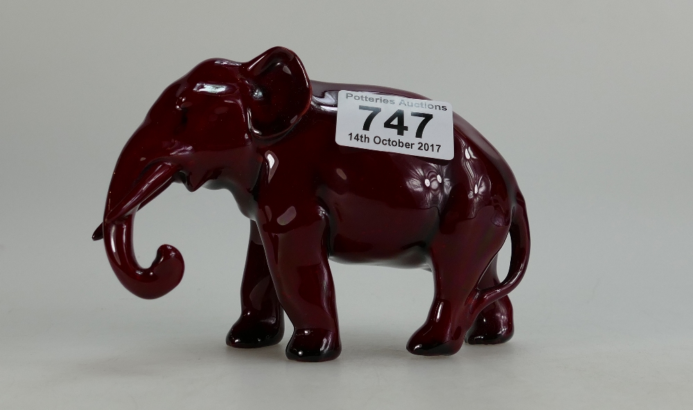Royal Doulton flambe model of small elephant with trunk down, height 10cm (slight glaze fault to end