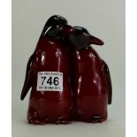 Royal Doulton Flambe model of a pair of penguins huddling, height 16cm