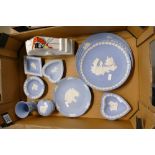 A mixed collection of Wedgwood Jasper ware to include commemorative plates, ashtrays, pin dishes,