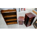 A reproduction oak four tier side unit with a reproduction revolving CD rack and a mahogany coal