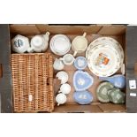 A collection of ceramic items to include Wedgwood trinket boxes, Wedgwood Peter Rabbit miniature tea