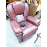 Arm chair in Burgundy leather.