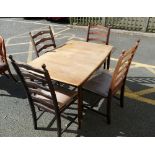 Oak G-Plan style extending dining table with four oak leather backed chairs. (5)