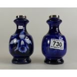Two small silver topped ceramic vases wi