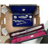 Cased silver manicure set with a cased d