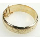 9ct gold hallmarked hollow bangle. Weight 25.