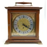Reproduction walnut mantle clock with German musical movement, height 31.
