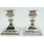 Pair of fine quality silver square base candlesticks, Londion 1890. Loaded bases.