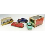 A collection of 1950's and 60's tinplate items to include Mettoy Garage, Caravan, Marx Hotrod,