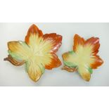 Clarice Cliff Newport pottery pair of orange & green shaped leaf dishes (2)