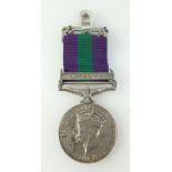 A Malaya General Service medal with clasp awarded to 2252647 SIGMN K.T BEAUMONT R.