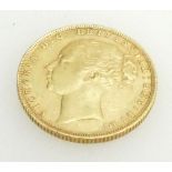 Full gold sovereign young head Victoria dated 1876