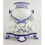 Wedgwood centrepiece of urn supported by two cherubs. Date code for Dec 1876.