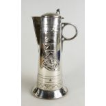 WMF silver plated claret jug with a embossed heraldic design 34cm