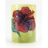 William Moorcroft small vase decorated in the Hibiscus design on yellow ground,