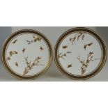 A pair of Cauldon cabinet plates,19th/20th century, decorated with gilded birds & foliage,