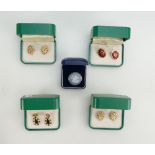 A collection of Minton branded boxed designer earrings and Wedgwood blue jasper ware brooch with