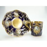 Coalport 19th century jewelled, gilded & hand painted coffee can & saucer.