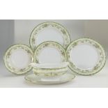 A large collection of Noritake floral decorated dinner ware to include tureens, serving platters,