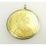 Austrian 4 ducat coin dated 1915 restrike - weight 14 grams with 9ct gold mount weight 2 grams