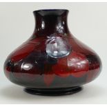 William Moorcroft large flambe squat vase decorated in the Wisteria design,