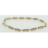 18ct white & yellow gold tennis bracelet set with 39 diamonds, 12.