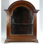 A small oak display cabinet that has been converted from 19th century oak grandfather clock hood,