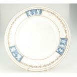 Minton Pate-sur-Pate plate decorated with three panels of cupids initialled by Richard Bradbury,