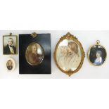 A group of portrait miniatures including Georgian portrait of a lady in blue dress,