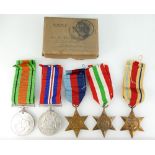 A group of Second World War medals including Victory medal, The Defense Medal, 1939-1945 Star,