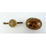 Yellow metal brooch set with amber and bar brooch with yellow metal ornate brooch later attached,
