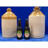 Pair of large brewery stoneware jars/bottles.