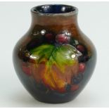 Moorcroft Flambe small vase decorated in the Leaf & Berry design,