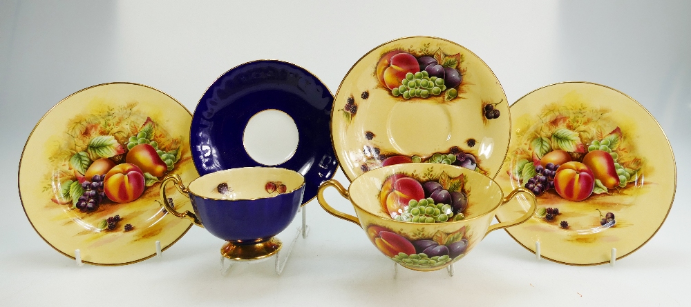 A collection of Aynsley Orchard Gold teaware items to include cups, saucers, bouillon cups,