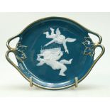 A Minton Bicentenary Pâte-sur-Pâte handled dish, decorated with cupids lighting candles, gilded rim,
