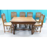 French 19th century carved oak dining table and six matching carved oak bergere chairs