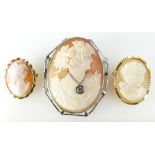 Large ladies cameo brooch in metal mounts and two smaller ones (3)