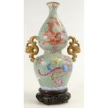 Chinese, double bodied vase with floral and dragon decoration. Chien Lung square mark to the base.