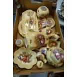 A collection of Aynsley Orchard Gold items to include ginger jars, trinket trays, wall plates,