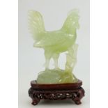 20th century Chinese carved jade model of a rooster on carved wood base, overall height 16.
