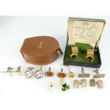 A collection of mans cufflinks,
