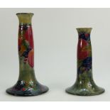 William Moorcroft Burslem candlestick decorated in the Pomegranate design on ochre ground,