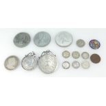 A collection of coins including early silver coins, commemorative coins,