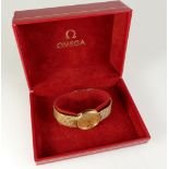 Omega gents Deville gold plated quartz date wristwatch with gold plated bracelet in original box