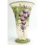 William Moorcroft Macintrye trumpet shaped vase decorated in the Wisteria design dated 1913,