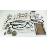 A collection of items to include silver photo frames, gold, silver and decorative jewellery sets,