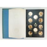 A collection of coins in Royal Air Force Museum collection leather album "The history of man in